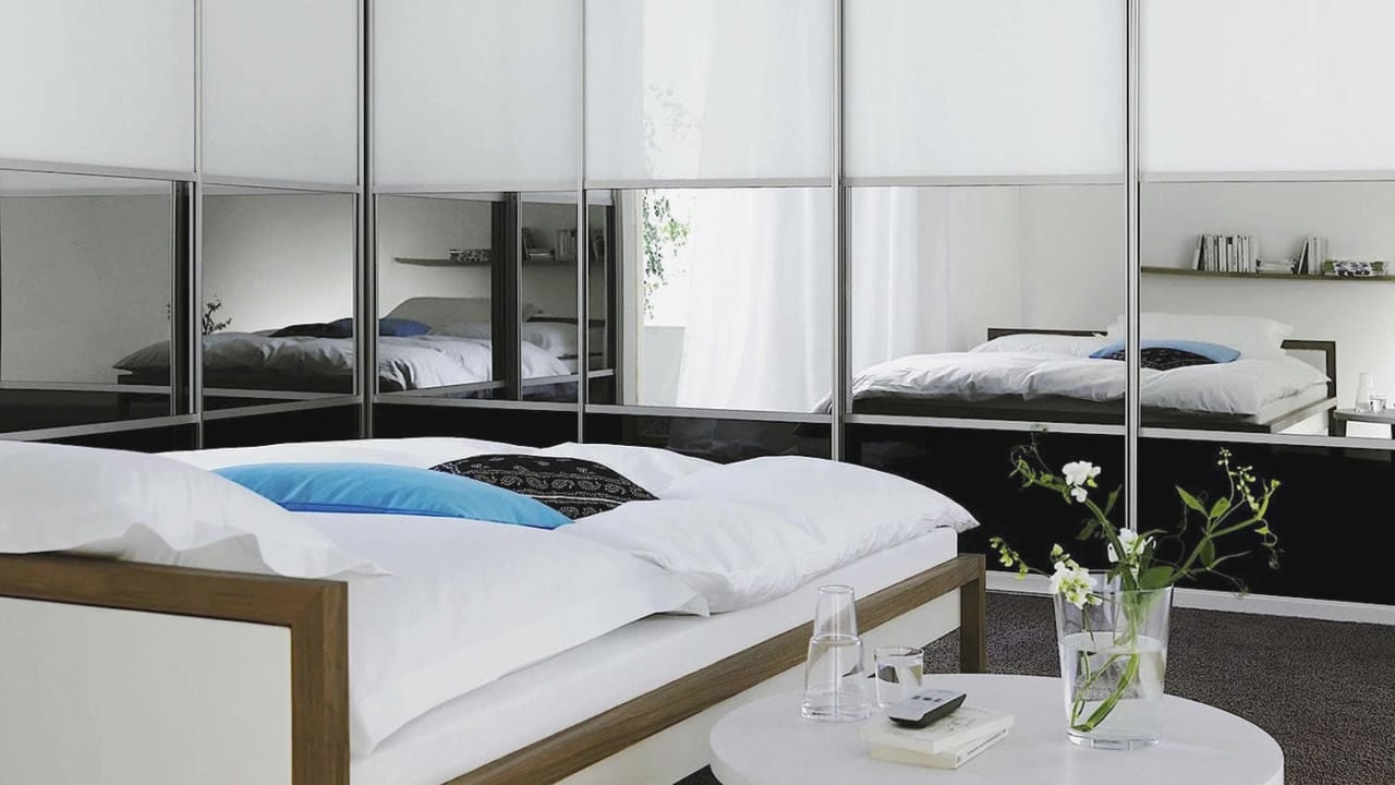 How Mirrored Wardrobes Can Enhance Your Bedroom